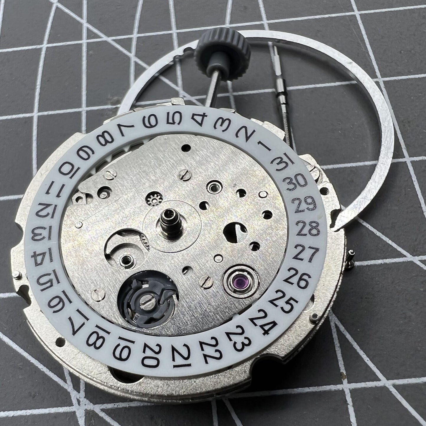 Miyota 821A quartz watch movement by Citizen, precise and durable Japanese timekeeping mechanism.