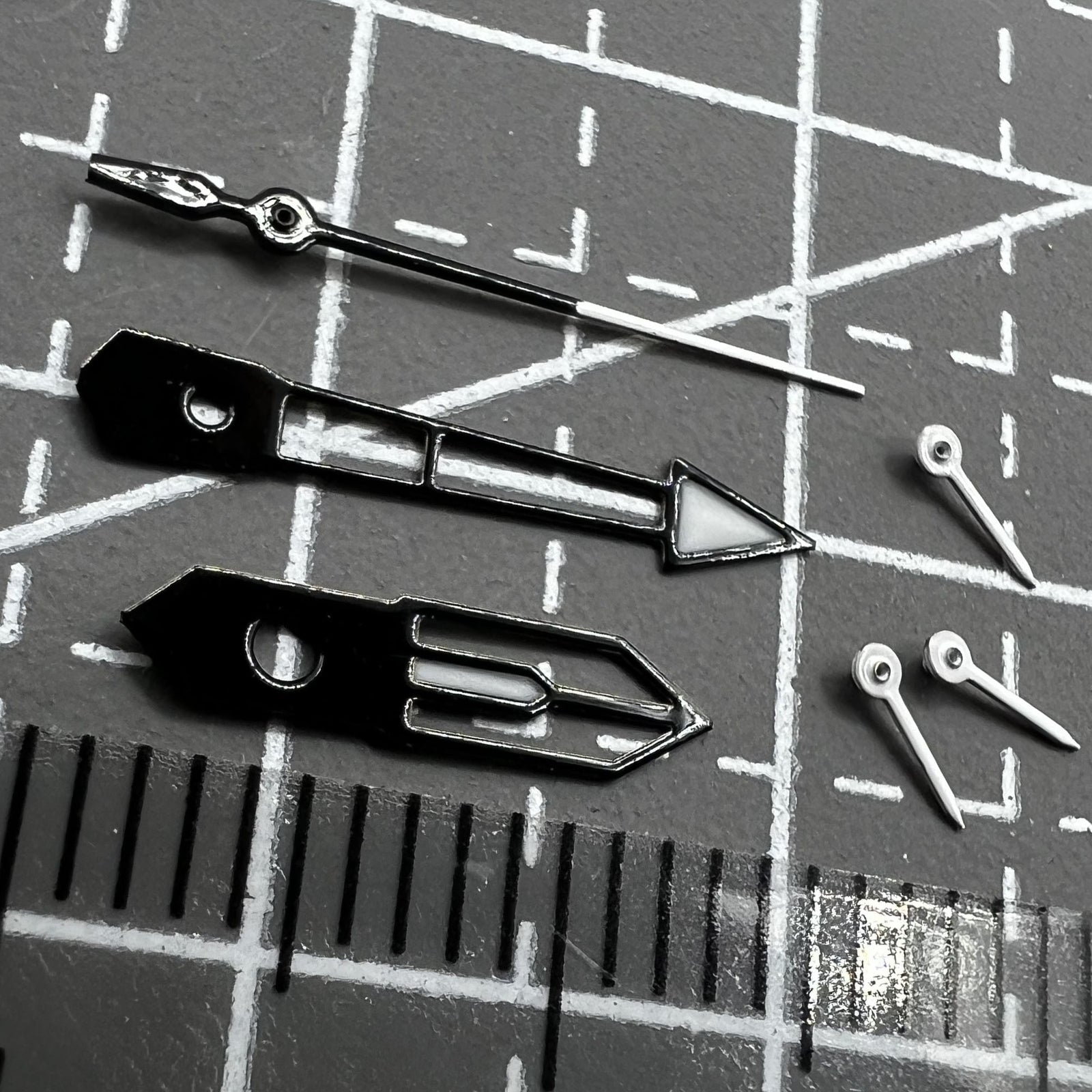 13mm green lume watch hands with white and black trim by PE90, ideal for precise timekeeping movements.