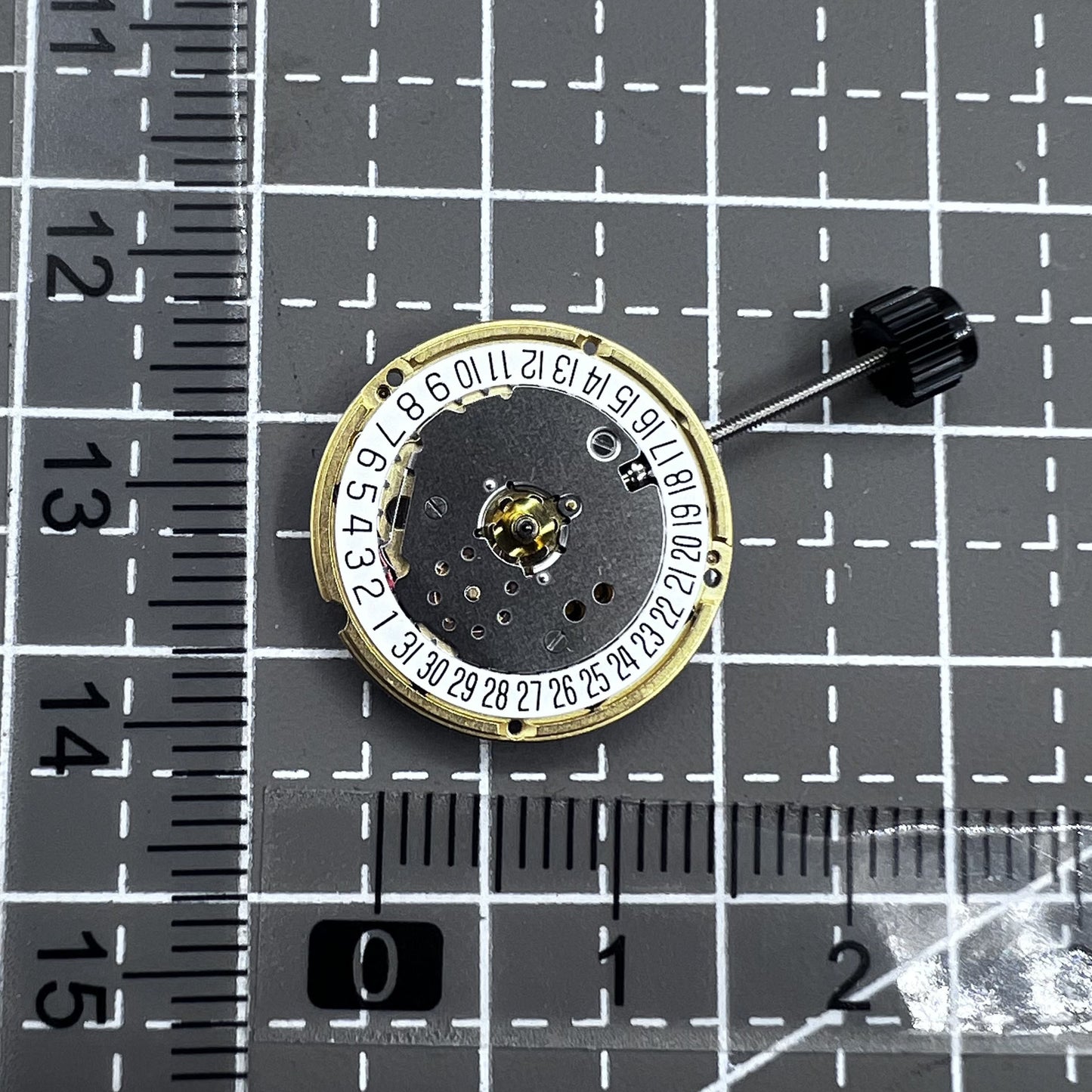 Swiss ETA F03.111 quartz watch movement with 3 hands and date at 6 o'clock, precision timekeeping.