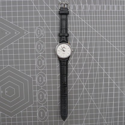 Beijing 31mm manual mechanical watch with silver case and double rhomb dial, classic Chinese craftsmanship.
