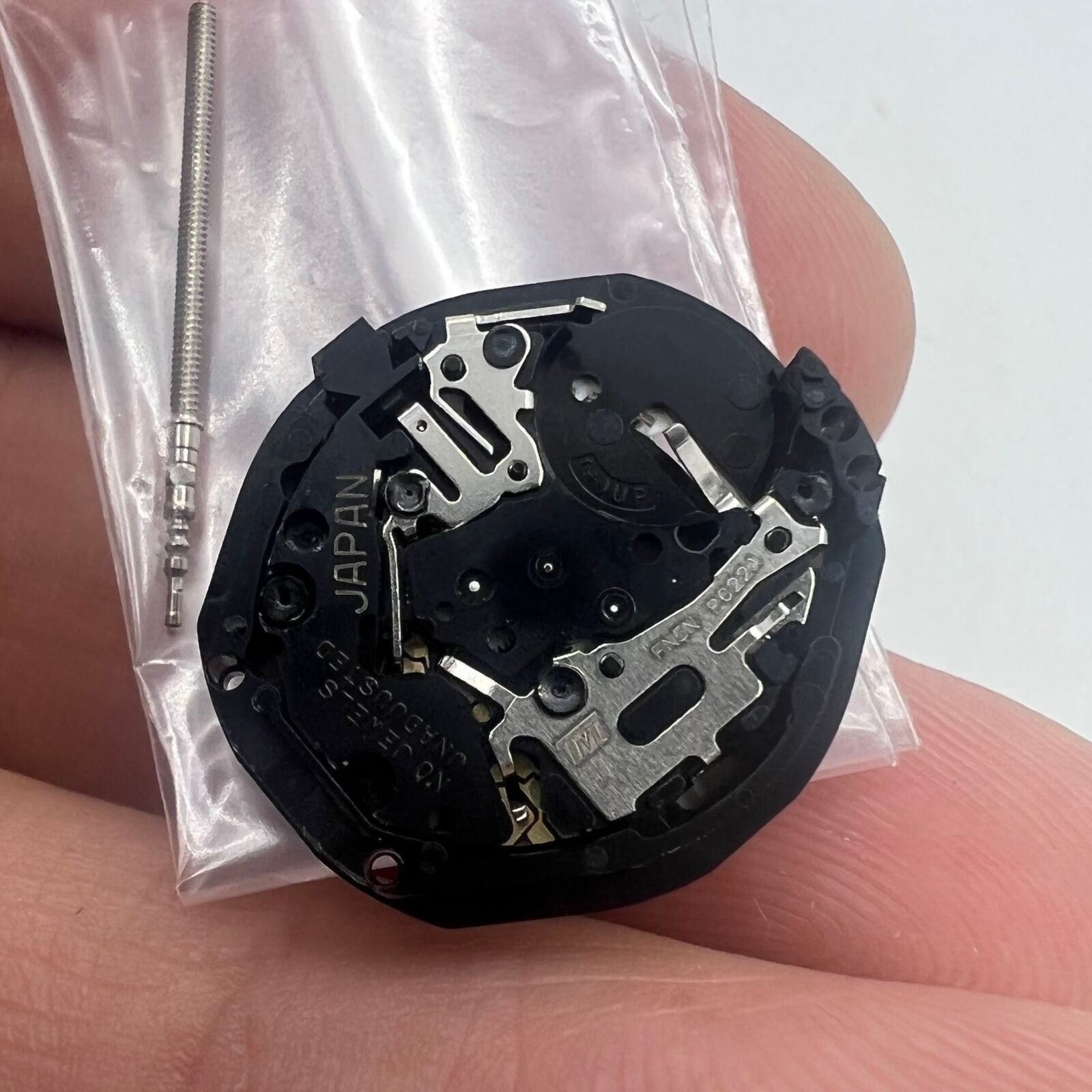 Set of 3 Hattori Epson PC22 quartz watch movements with dual date windows, Japan made, for precise timekeeping.