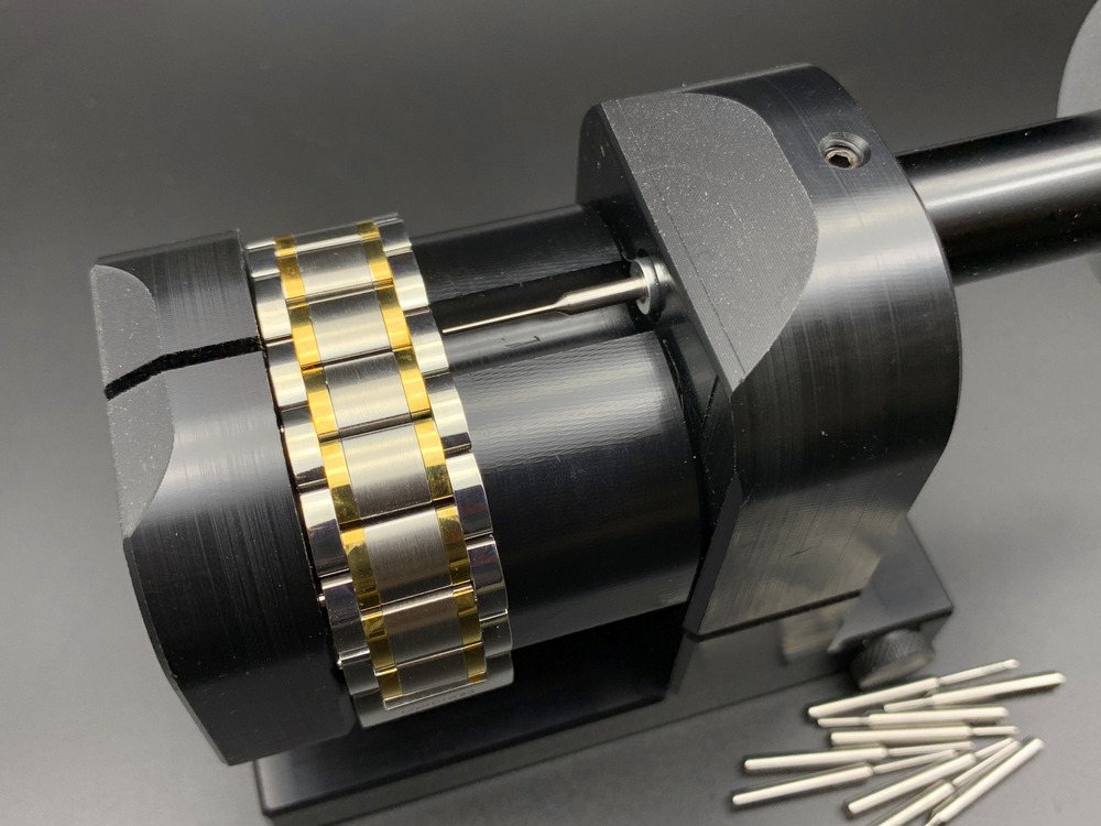 Adjustable link pin remover tool for precise watch bracelet chain adjustments.