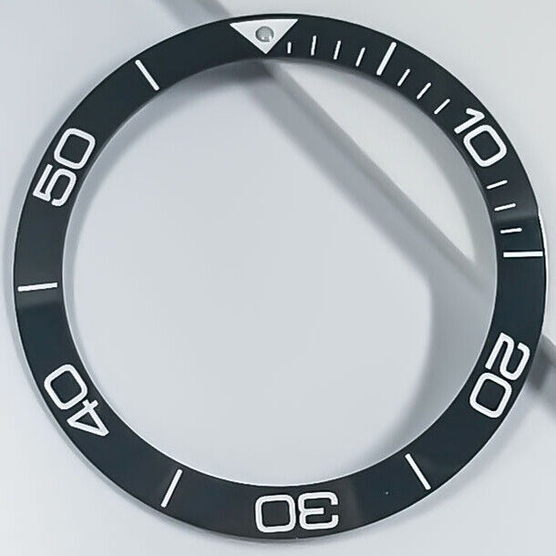 Ceramic blue luminous bezel ring by Conquest for 38.5mm watch, enhancing style and durability.