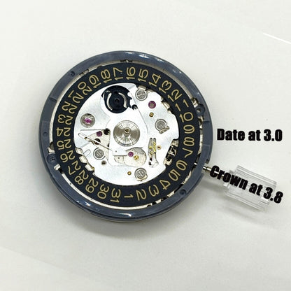 Close-up of NH35A automatic movement with golden date and 3 o'clock crown, compatible with SKX007 by Seiko.