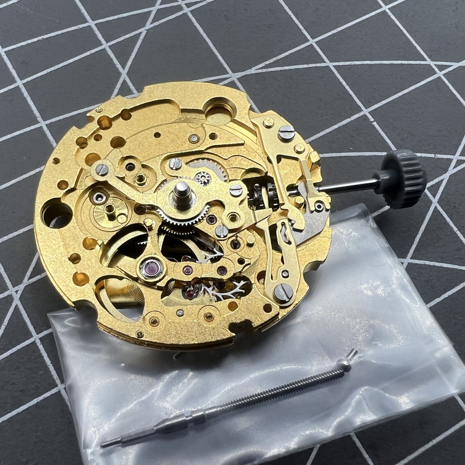 Miyota/Citizen 82S5 golden plated automatic mechanical watch movement for precise timekeeping and durability.