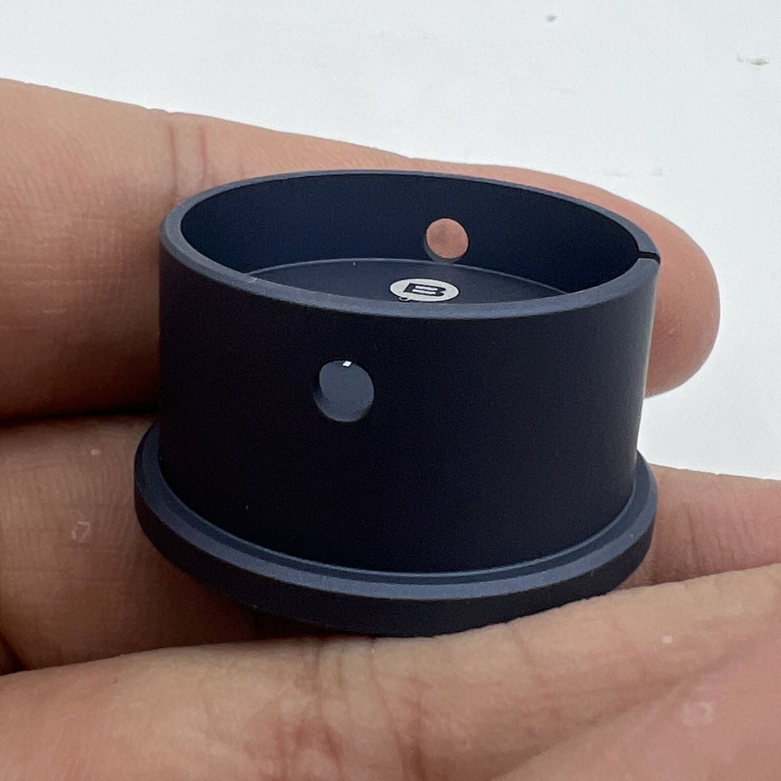 Bergeon 7100-11 1/2 watch movement holder gripping watch parts for accurate repair work.