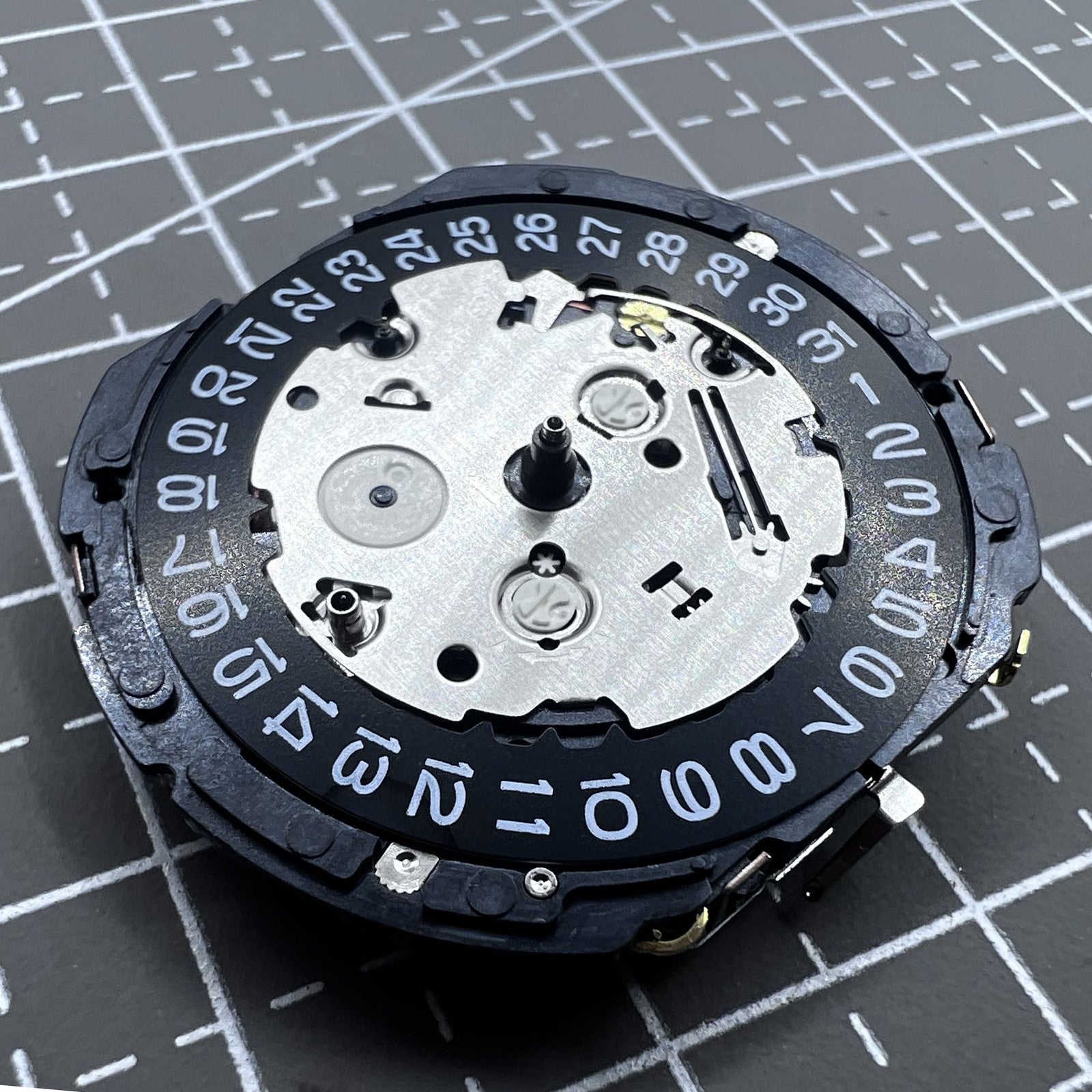 Seiko 7T62A quartz movement close-up showcasing precise Japanese craftsmanship in watch accessories.