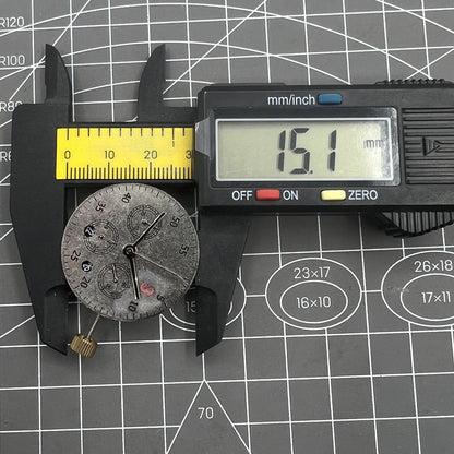 Dandong 7750 mechanical watch movement with black dial, small seconds at 6 o'clock, date window, precise timekeeping.