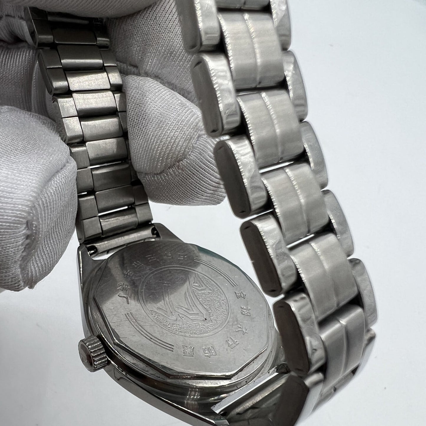 Chinese Taihang 32mm manual watch with black dial, golden markers, and 17-jewel precision movement