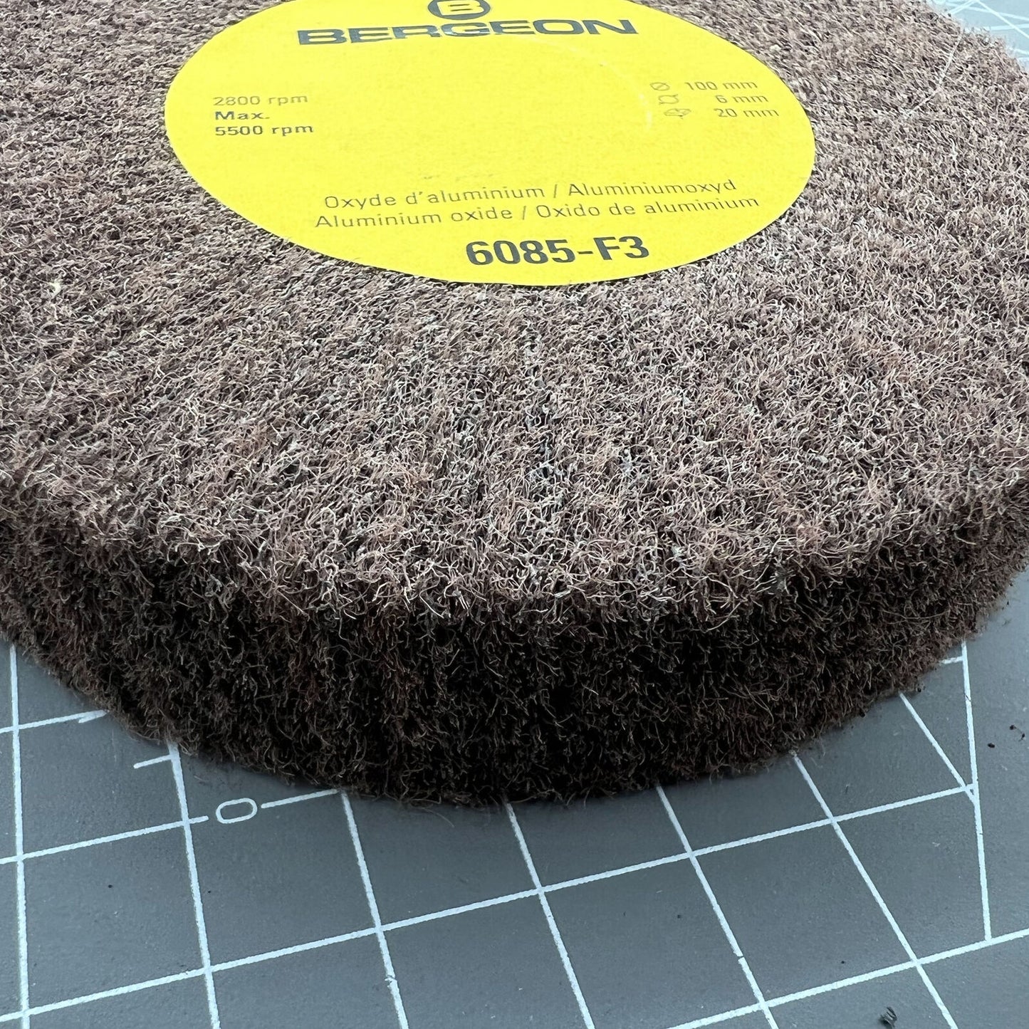 Bergeon 6085-F3 aluminum oxide abrasive wheel, very fine grain for precise watch accessory polishing.