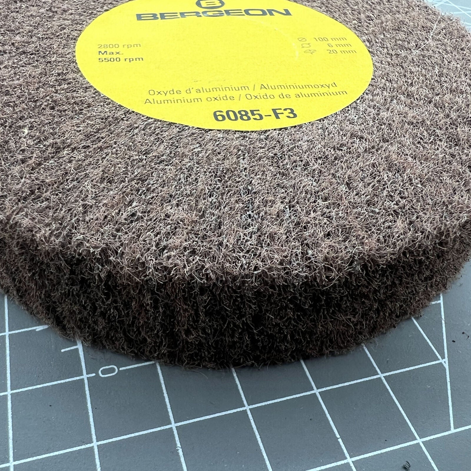 Bergeon 6085-F3 aluminum oxide abrasive wheel, very fine grain for precise watch accessory polishing.