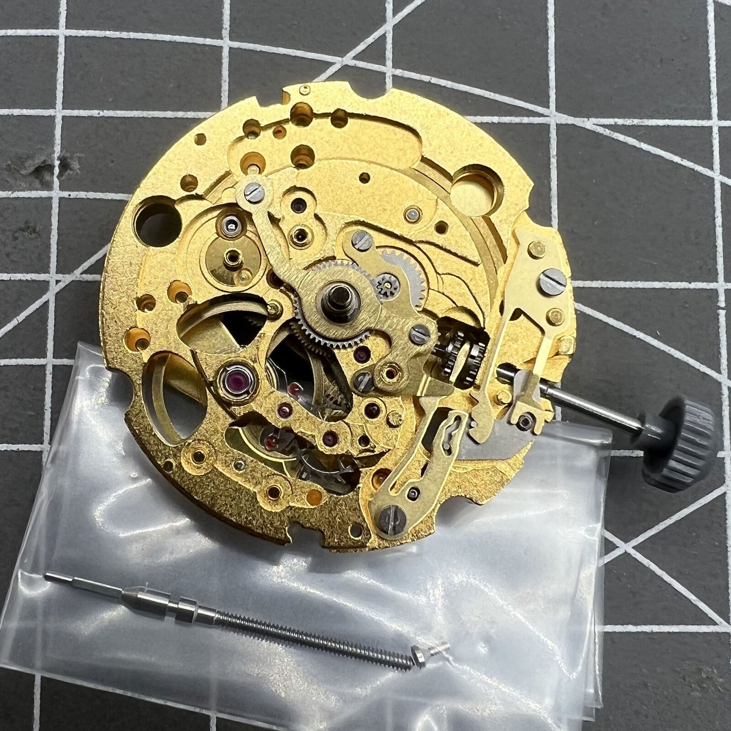 Miyota/Citizen 82S5 golden plated automatic mechanical watch movement for precise timekeeping.