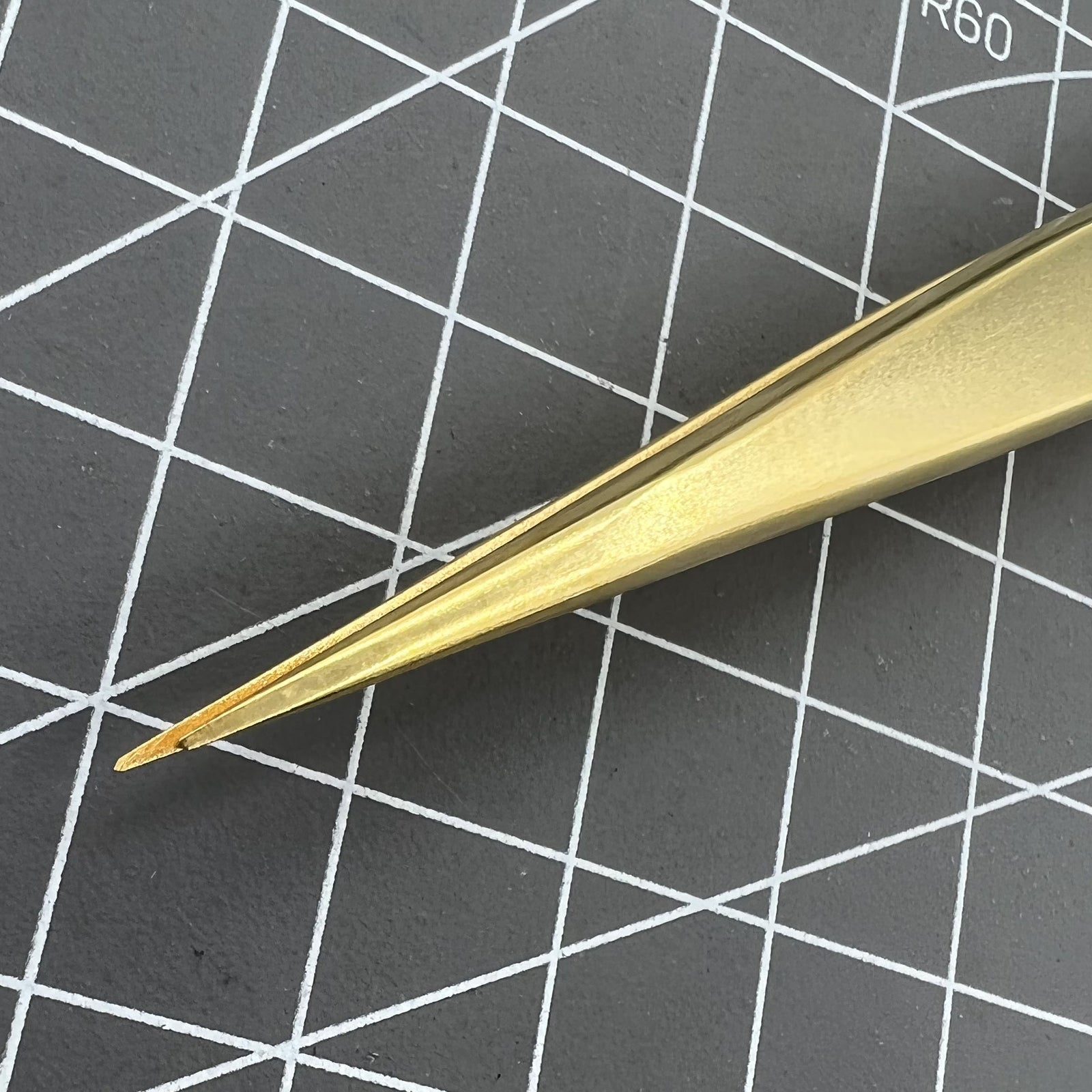 Swiss Made Bergeon gold-plated antimagnetic brass tweezers for precise watch part handling