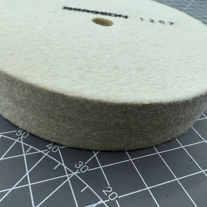 Swiss Bergeon 1207 white felt polishing wheel for precise watch accessory finishing and polishing.