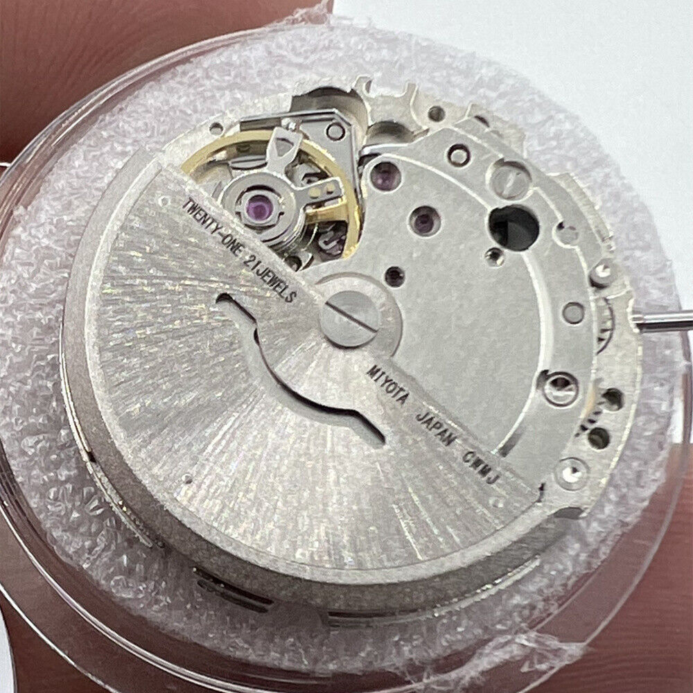 Miyota/Citizen 8215 watch with black dial, date at 6, Japanese automatic movement for accuracy and style.