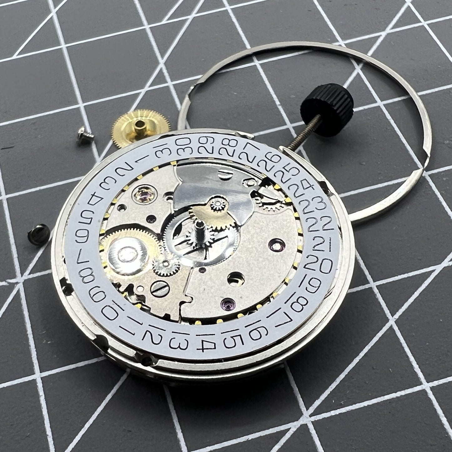 Original Silver SW200-1 automatic watch movement by ETA, precise mechanical replacement part for watches.