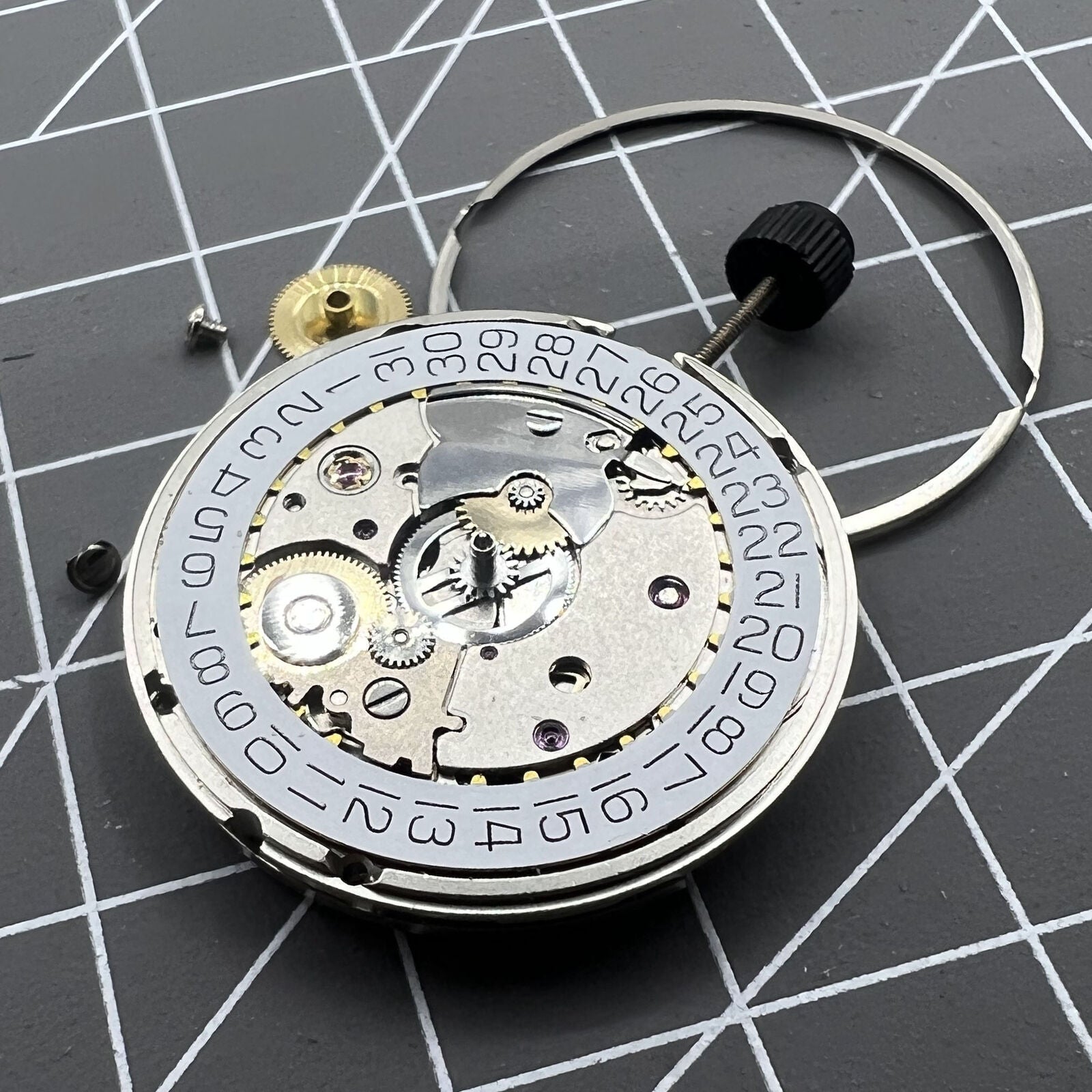 Original Silver SW200-1 automatic watch movement by ETA, precise mechanical replacement part for watches.