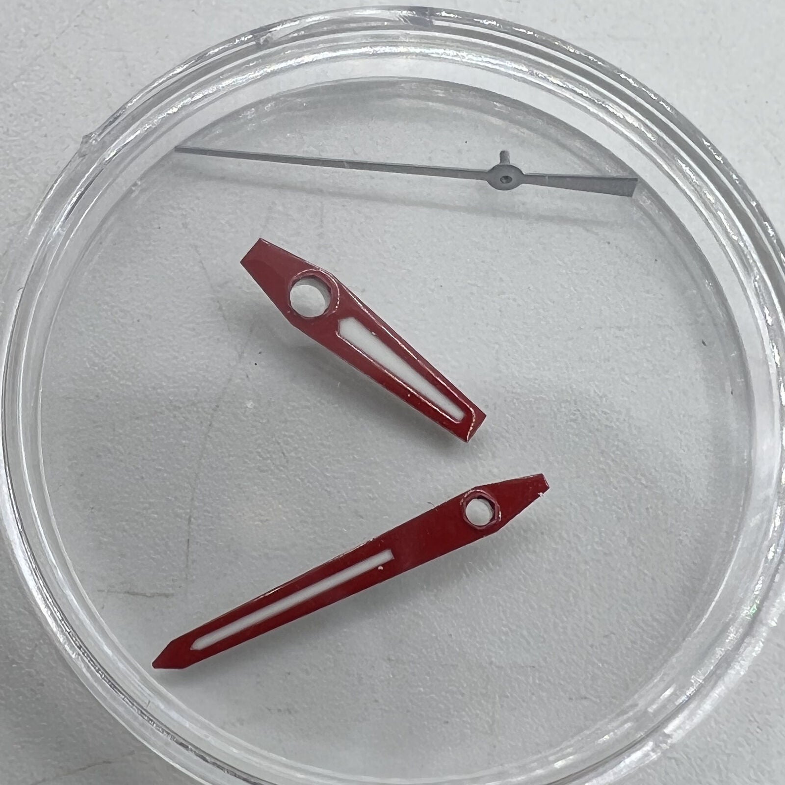 Red-trimmed watch hands with green luminous fill for Miyota 8215, 8205, DG2813, ideal for watch repairs.