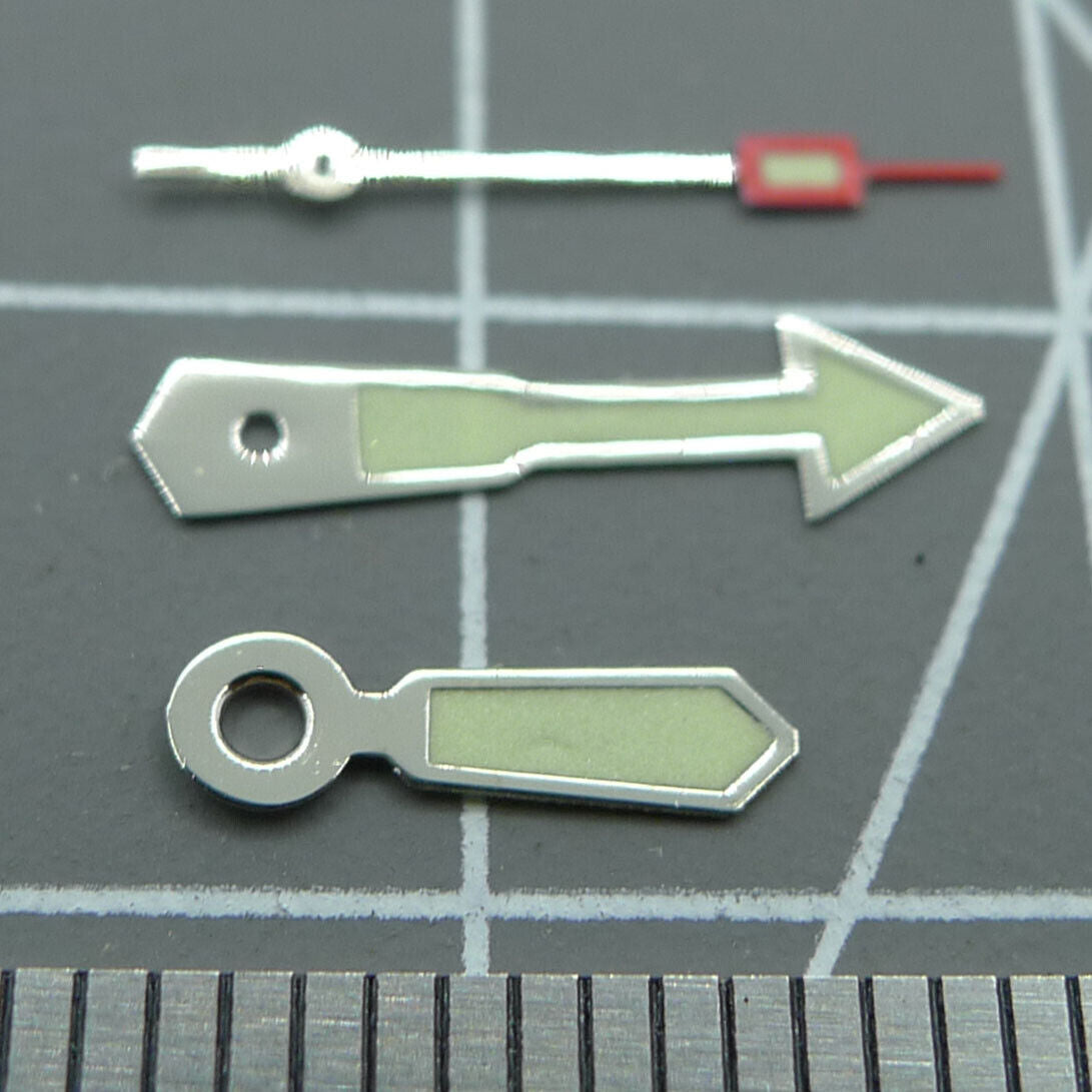 Arrow-shaped silver-trimmed green lume watch hand for Miyota 2035 movement.