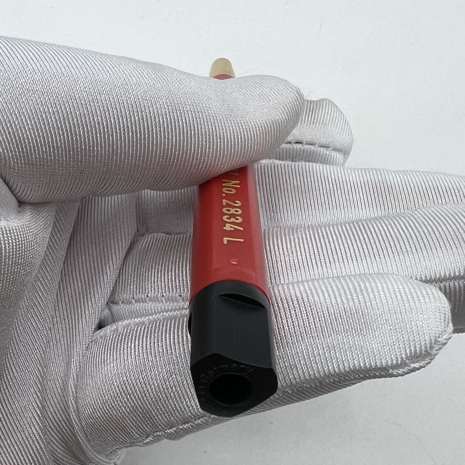 Bergeon 2834-L brass scratch brush with 10mm pen shape for precise Swiss watch accessory cleaning.