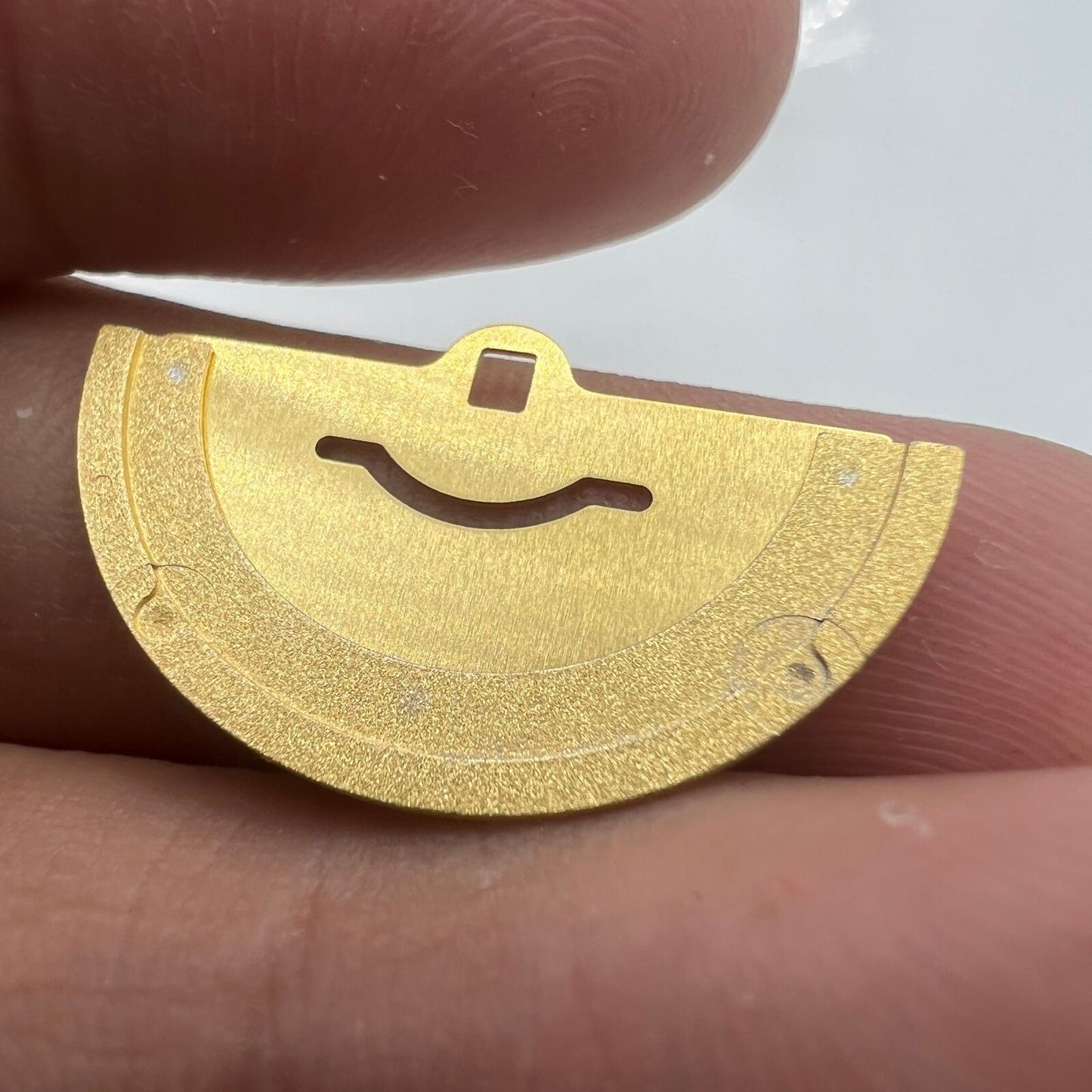 Golden rotor oscillating weight for Miyota 8200 movement, smooth winding, generic watch accessory.