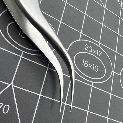 Swiss Bergeon 7026-7 antimagnetic tweezers with fine curved tips for precise watch accessory adjustments.