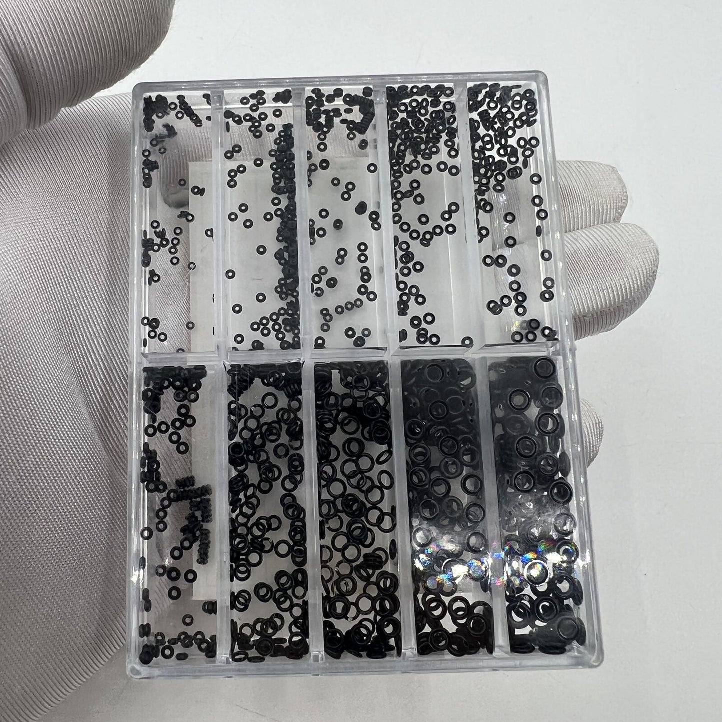 Waterproof rubber O ring gasket for watch crowns, ensures seal and protection ? assorted sizes, durable design.