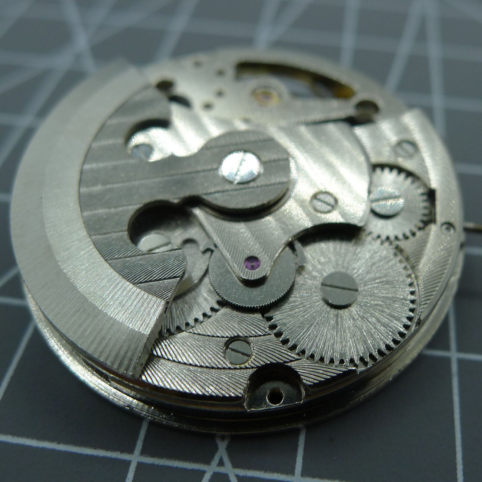  automatic mechanical watch featuring silver 3 hands and elegant hollow moon phase display at 12 o'clock.