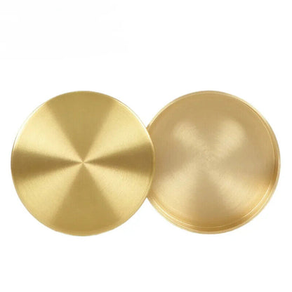 Steel and copper watch oil cylinders, ideal for precise cleaning and repair of watch mechanisms.