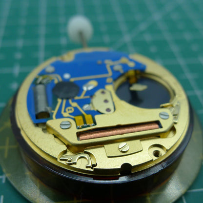 Swiss Made ETA 955.132 quartz watch movement showing double calendar with week at 12 and date at 3.