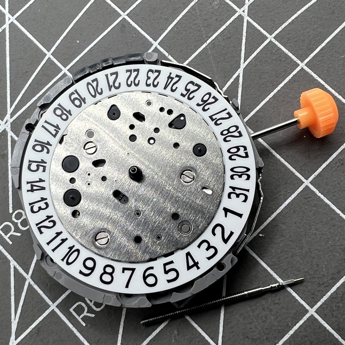 Miyota JP21 Quartz watch movement with date display at 3 o'clock for precision timekeeping.