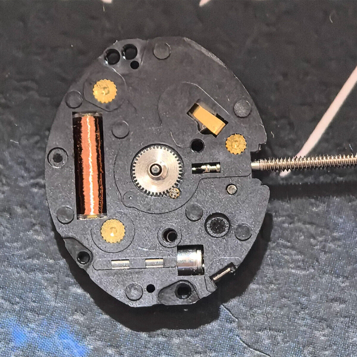 TMI VX10A quartz watch movement with 2 hands, Japan made, for precise watch repairs and replacements.