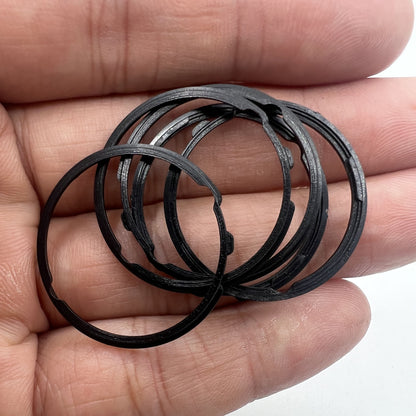 Black cushion mount spacer ring for Orient 46941 movement, securing watch dial fit precisely.