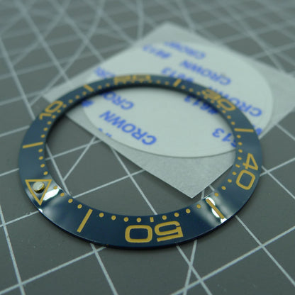 41,5 mm/32,5 mm himmelblaue Lünette gelbe Schrift Keramikuhr Lünetteneinsatz 