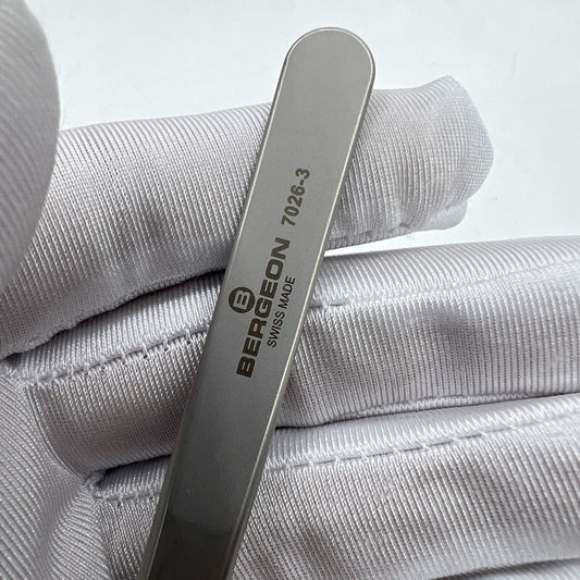Swiss Bergeon antimagnetic fine hairspring tweezers model 7026-3 for precise watch repair.