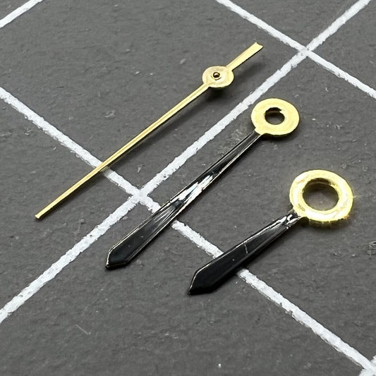 Arrow-shaped watch hands for Ronda 763 quartz movement, compatible with various watch models.