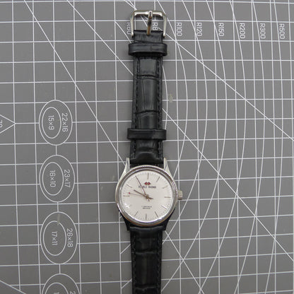 Beijing 31mm manual mechanical watch with silver case, double rhomb dial, showcasing classic Chinese craftsmanship.
