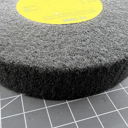 Swiss Bergeon 6085-E4 ultra fine abrasive satin wheel for precise watch accessory polishing and finishing.