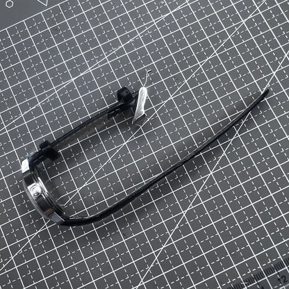 27mm Kongque watch with black leather strap, silver dial, gold markers, and manual mechanical movement.