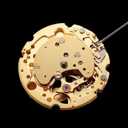 Golden plated Miyota Citizen 82S7 automatic watch movement showcasing intricate mechanical precision.