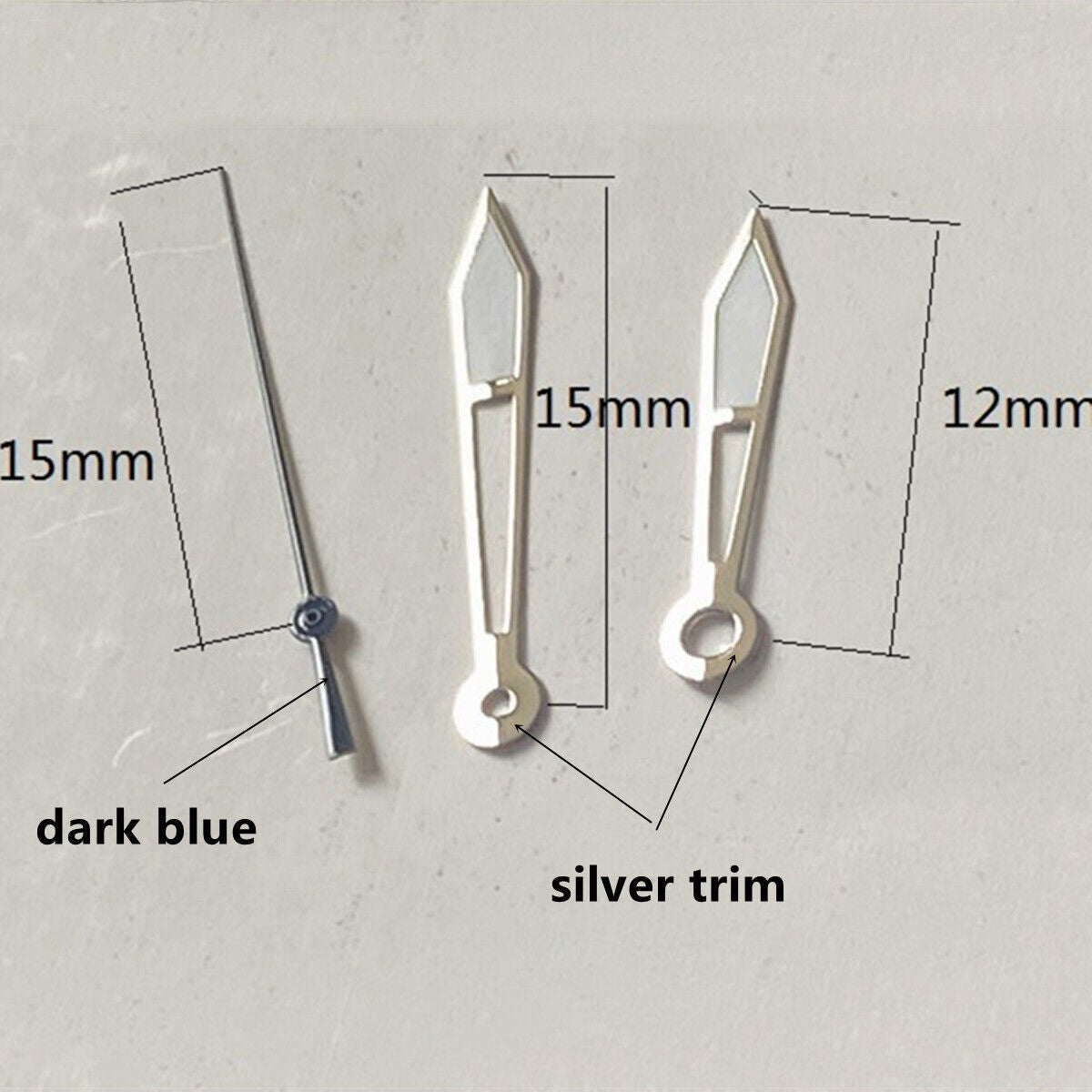 Silver watch hands with dark blue trim and green luminescent coating for Ronda 515 quartz movement, stylish and easy to read.