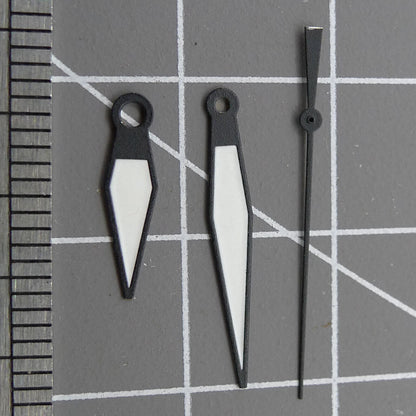 White diamond-shaped orange lume watch hands designed for ETA2836/2846/2824/2846 movements by White+diamond.