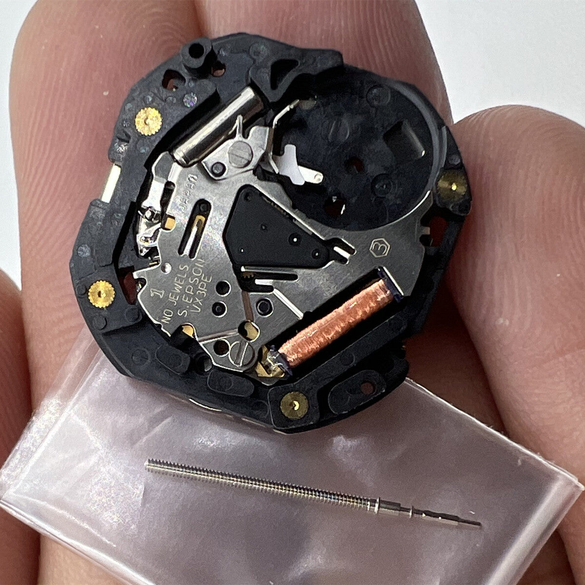 Hattori Epson VX3PE quartz movement close-up, ensuring precise timekeeping in Japanese watch accessories.