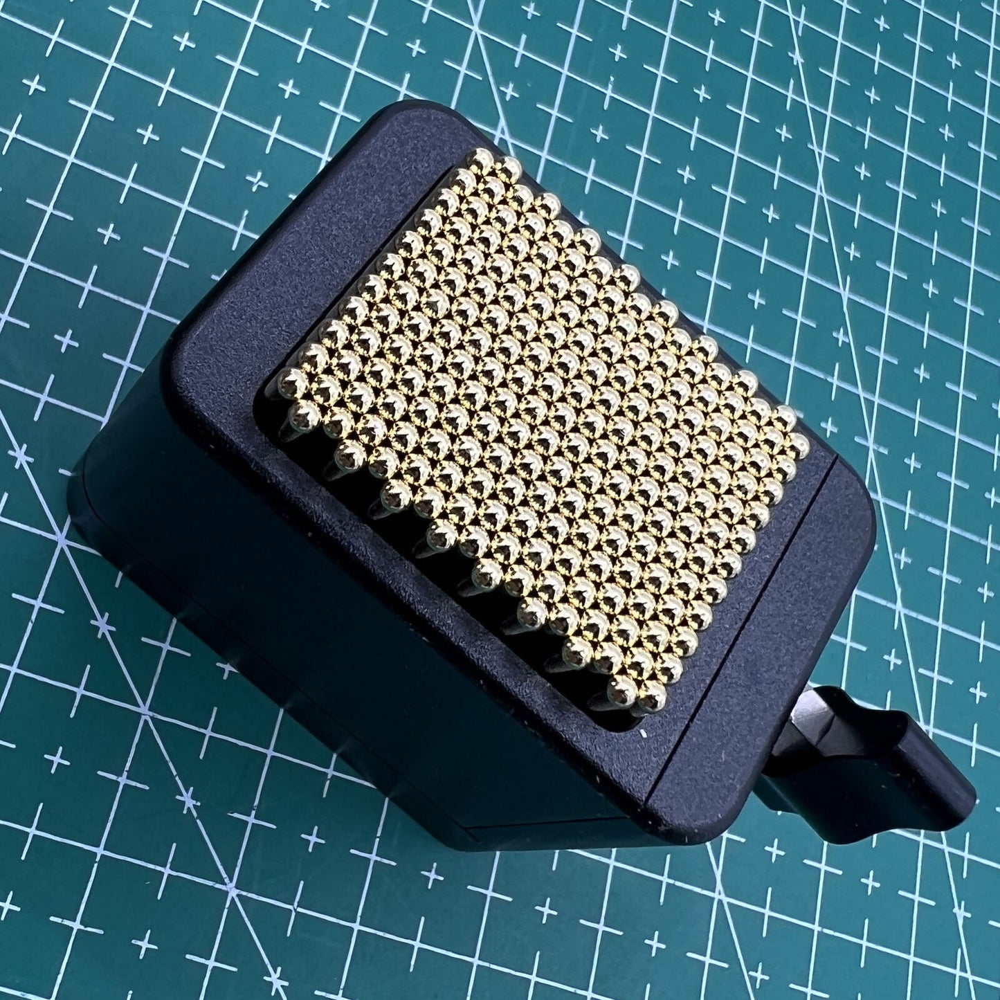 Universal metal movement holder with beads for secure watch repair, fits all shapes - Generic brand accessory.