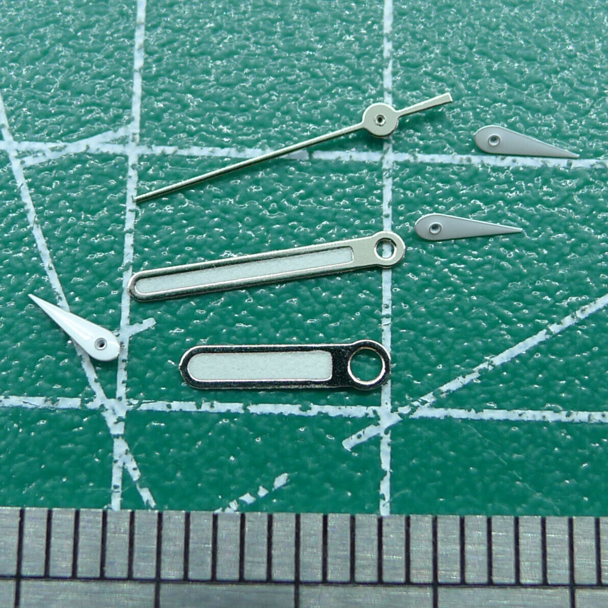 Wholesale 10mm green luminous watch hands, compatible with Miyota 0S10 movement, ideal for repair projects.