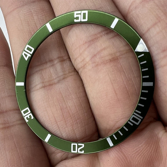 Green aluminum bezel insert for 39mm/32mm watches, enhancing style and durability.