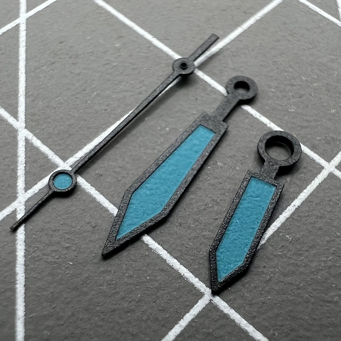 Blue luminous polished black trim watch hands for ETA2836/2846/2824/2846 movements, precise and sleek replacement parts.