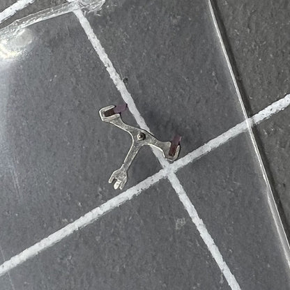 Pallet fork for Dandong 7750 watch movement, precision replacement part for reliable timekeeping.