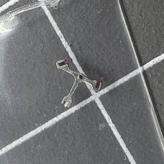 Pallet fork for Dandong 7750 watch movement, precision replacement part for reliable timekeeping.