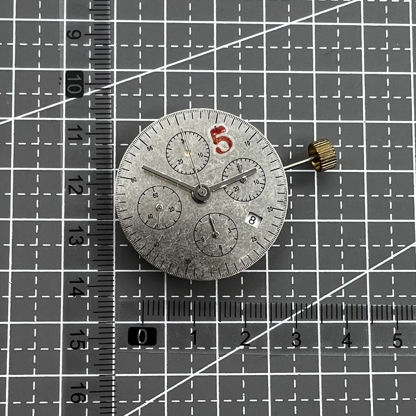 Dandong 7753 automatic watch movement showing small second dial at 9 o'clock position for precision timekeeping